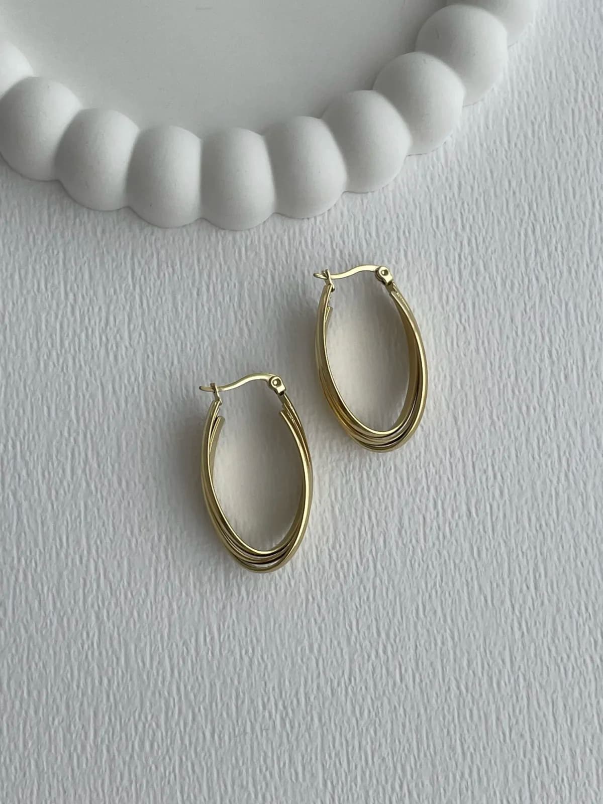 Çelik Çapraz Tasarım Gold Oval Halka Küpe