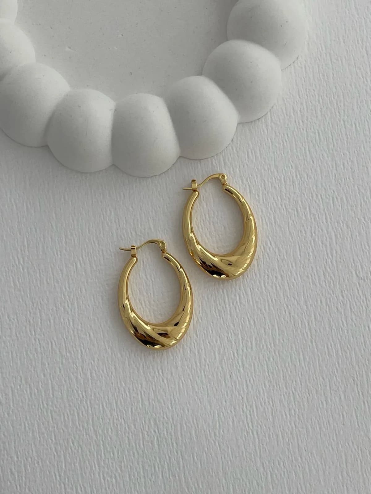 Çelik Desenli Oval Tasarım Gold Halka Küpe