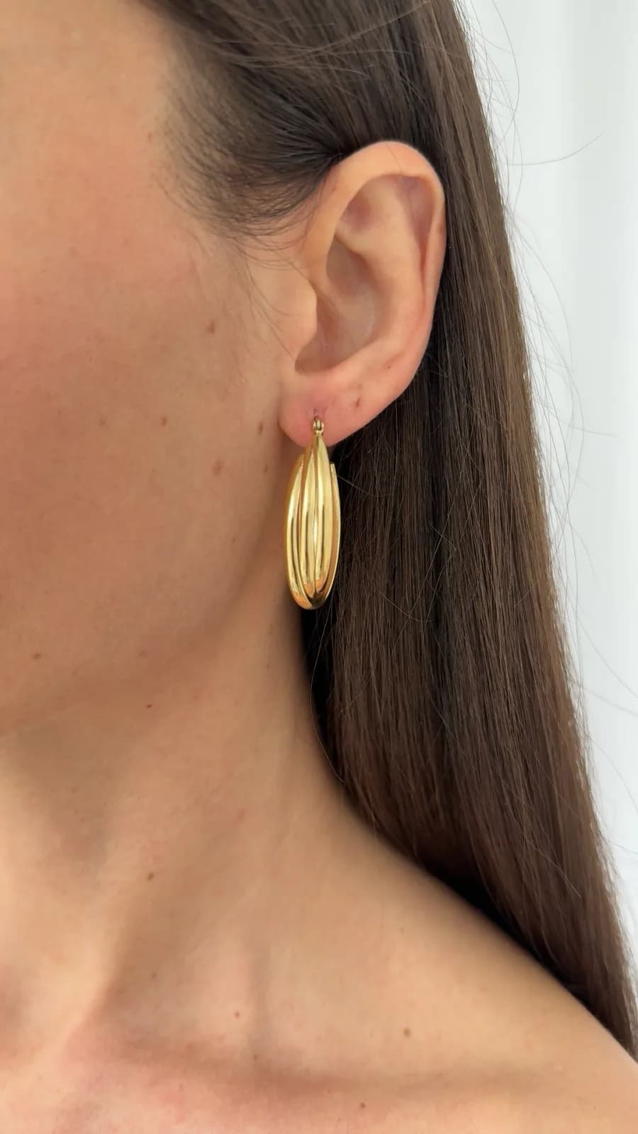 Çelik Çapraz Tasarım Gold Oval Halka Küpe