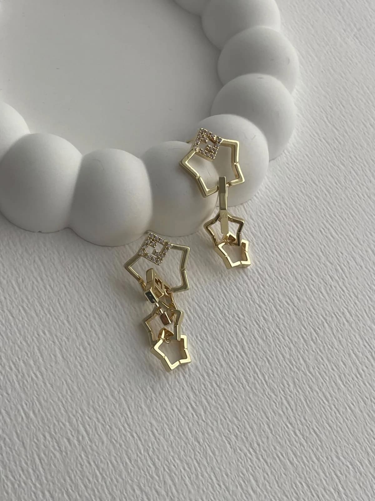 Özel Seri Marka Model Dörtlü Yıldız Zirkon Taşlı Gold Küpe