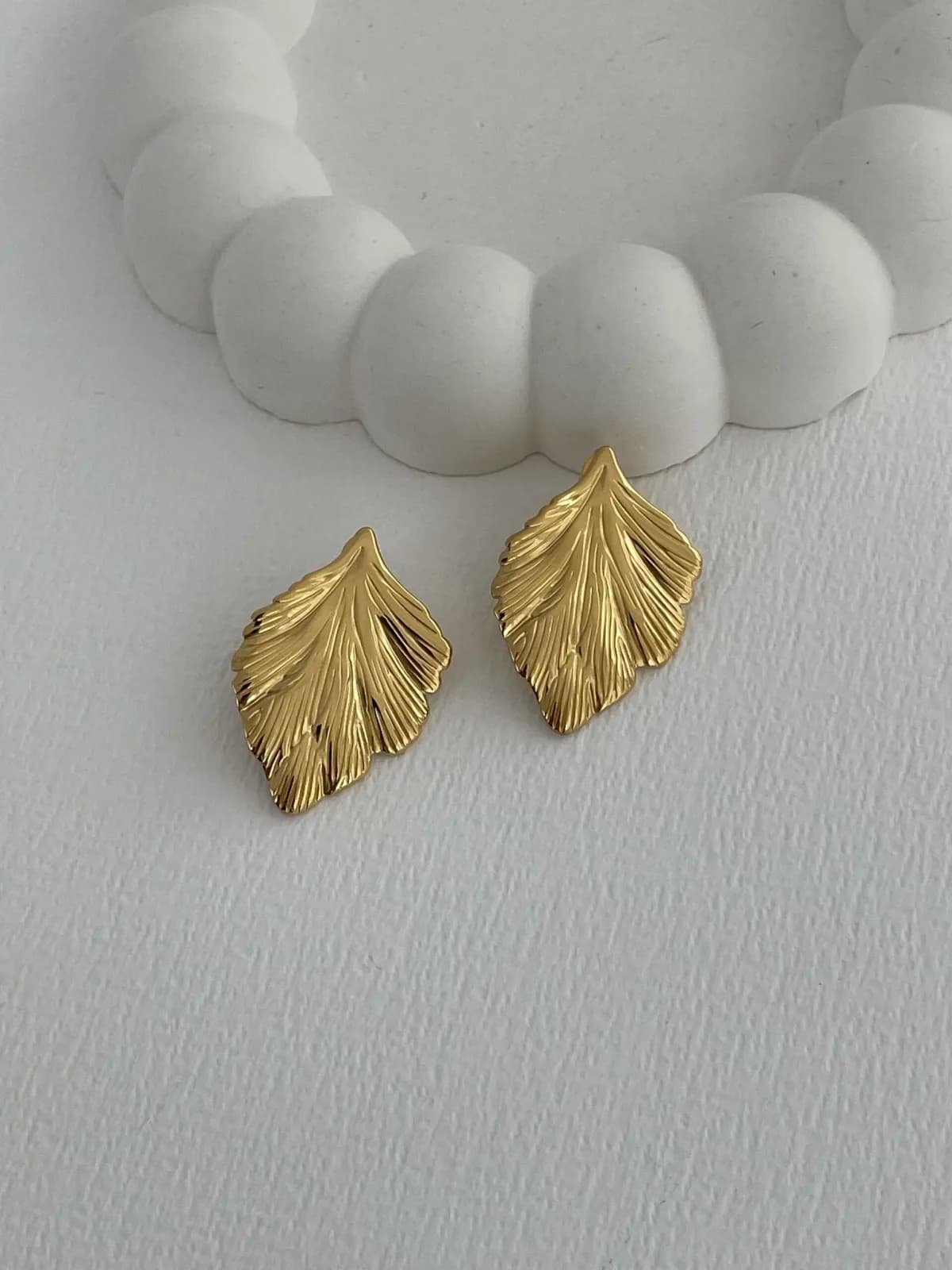Çelik Yaprak Tasarım Gold Küpe